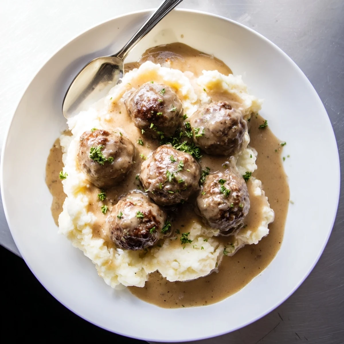 Slow-simmered Crockpot Meatballs Gravy with rich mushroom aroma, perfect for dinner.